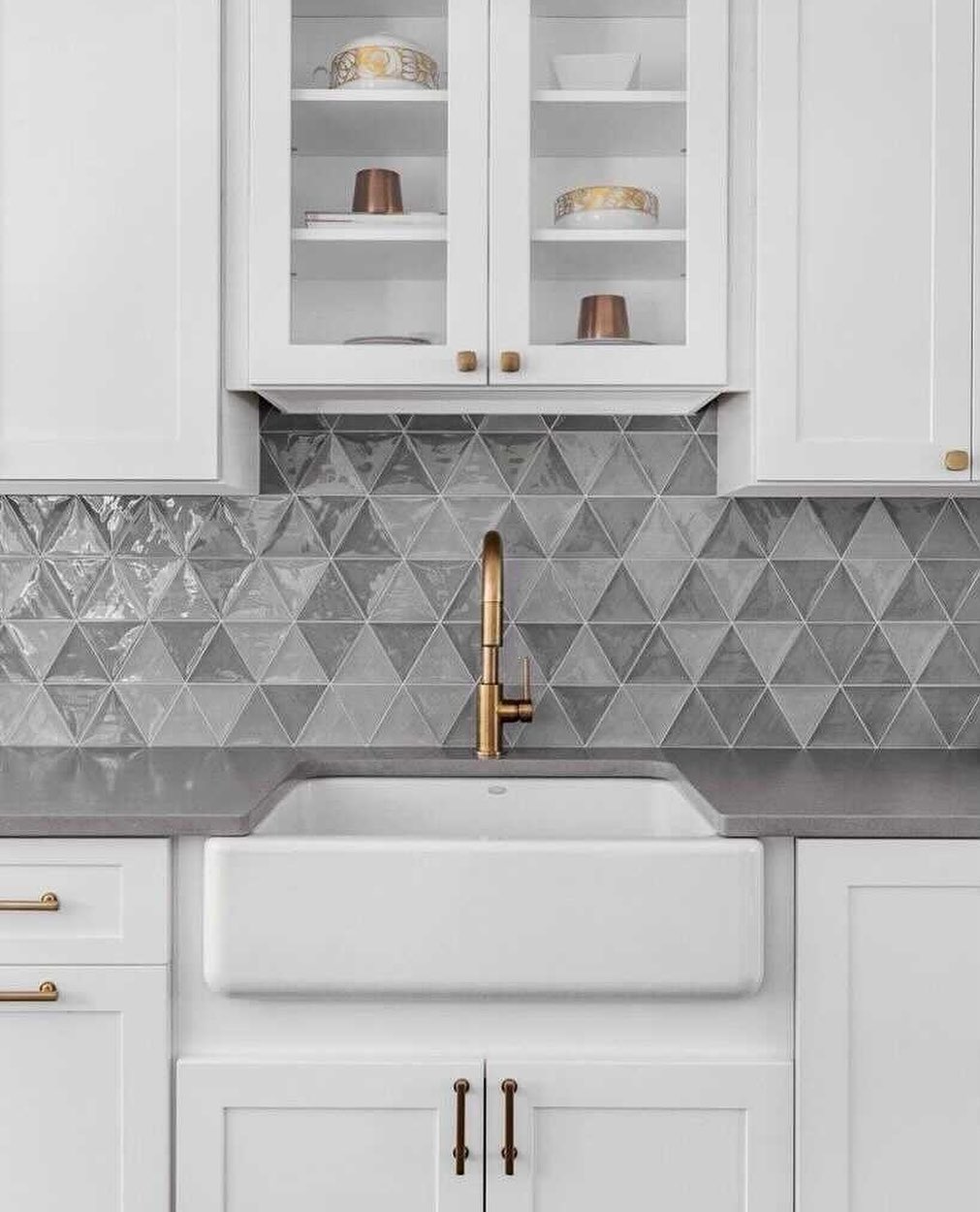 our Bellami Triangulo Grigio 5x4 Glazed Ceramic Tile shown in the kitchen as a backsplash and wall tile