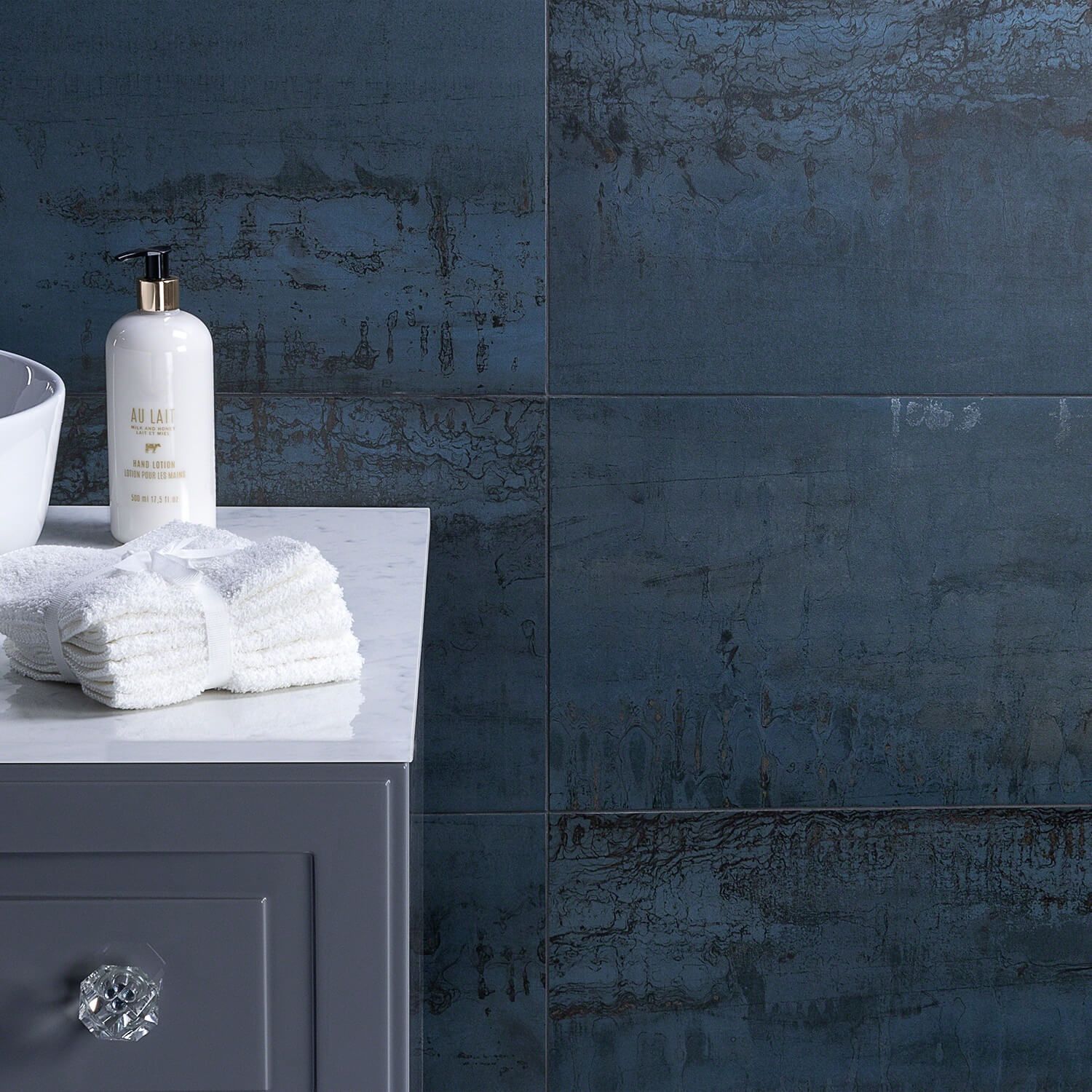 INSPIRA BY ANGELA HARRIS deep blue tiles used on bathroom wall