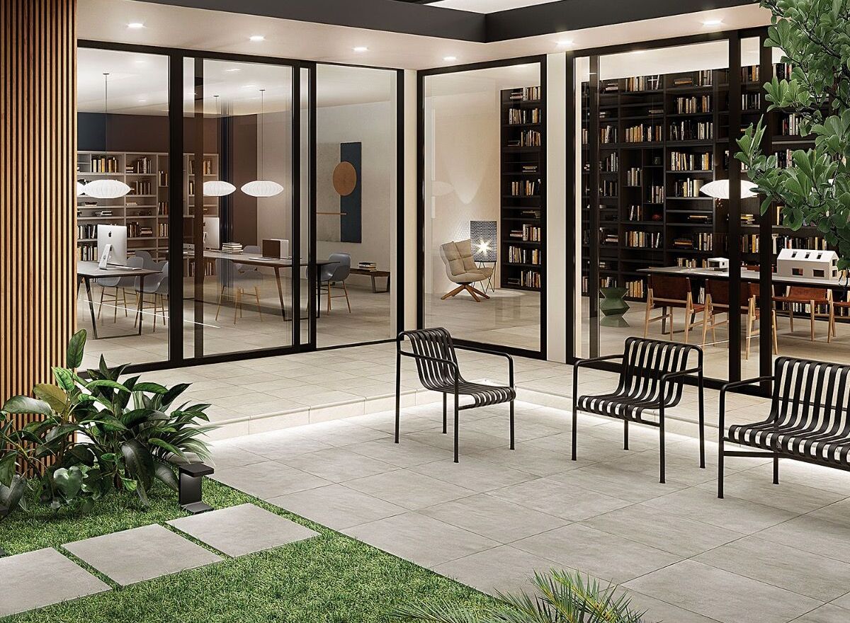 Our Trail Outdoor Porcelain Paver shown outside in seating area 
