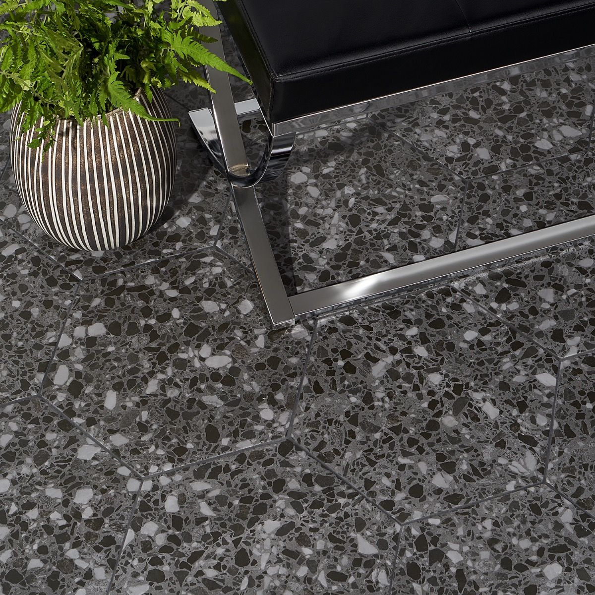Six Hexagon Graphite 12.5" Matte Porcelain Tile shown in an outside floor setting